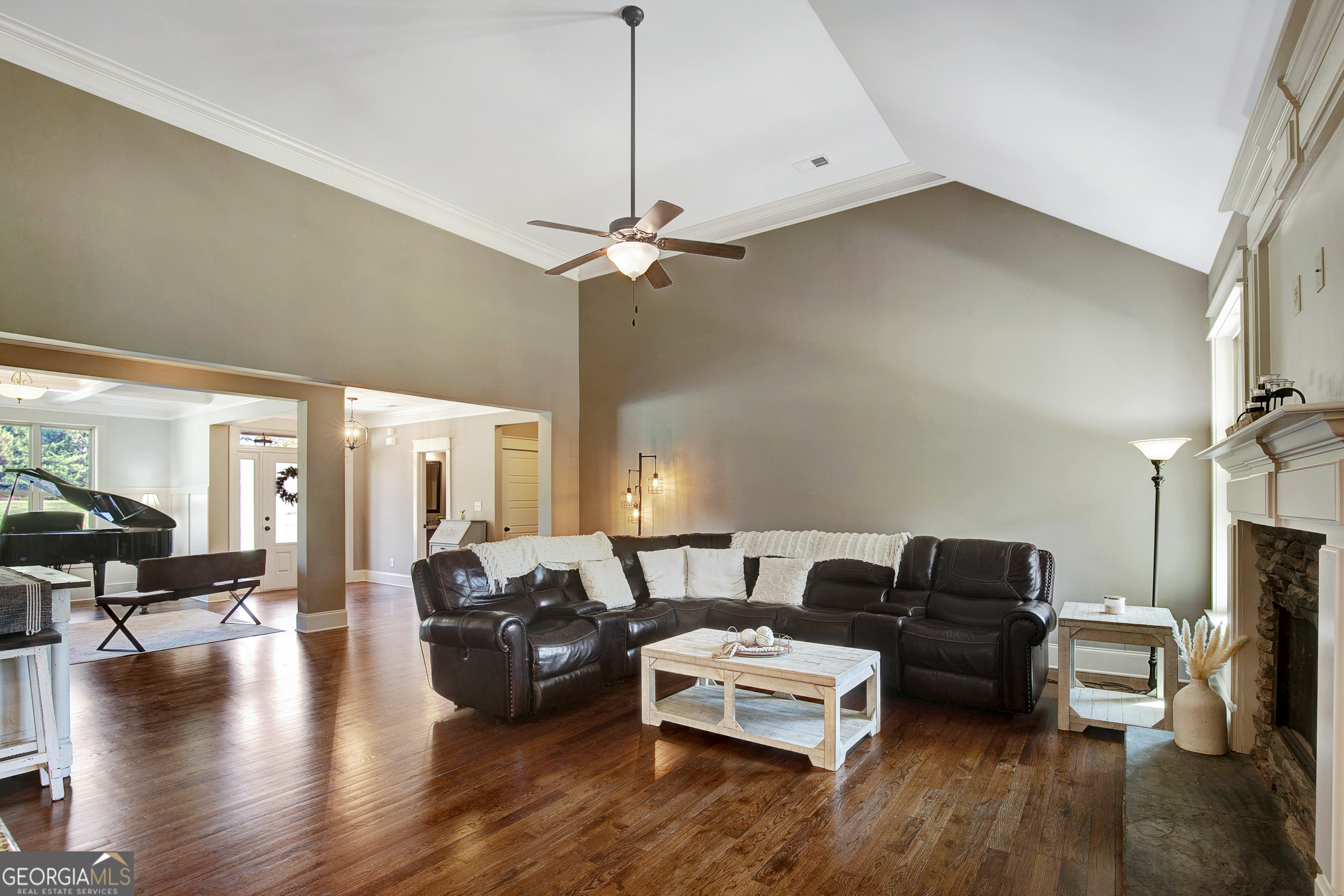 137 Kenmare Row Tyrone, GA 30290 - Photo 15 of 54 a living room with furniture ceiling fan and a wooden floor