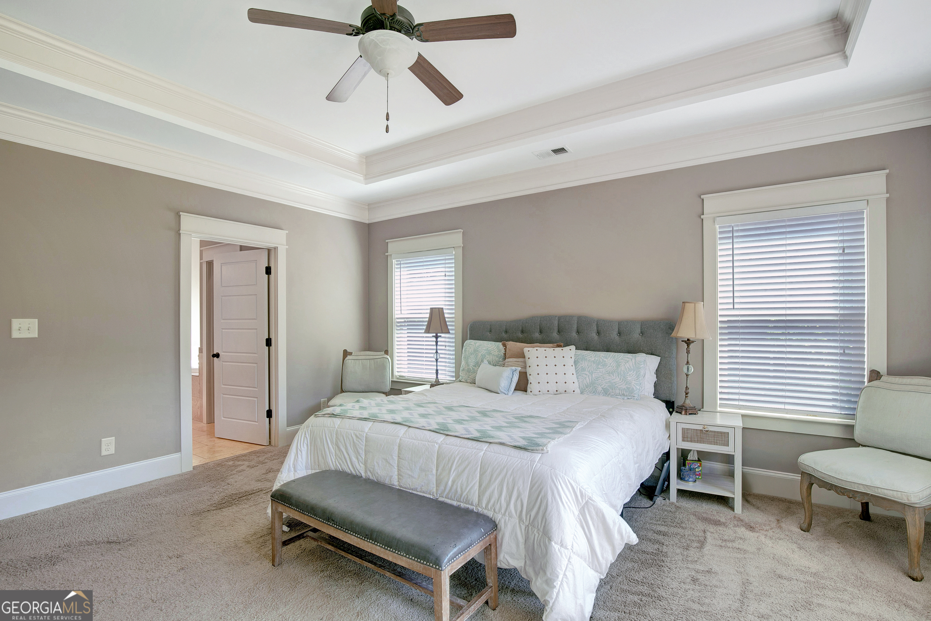 137 Kenmare Row Tyrone, GA 30290 - Photo 26 of 54 a bedroom with a bed and furniture