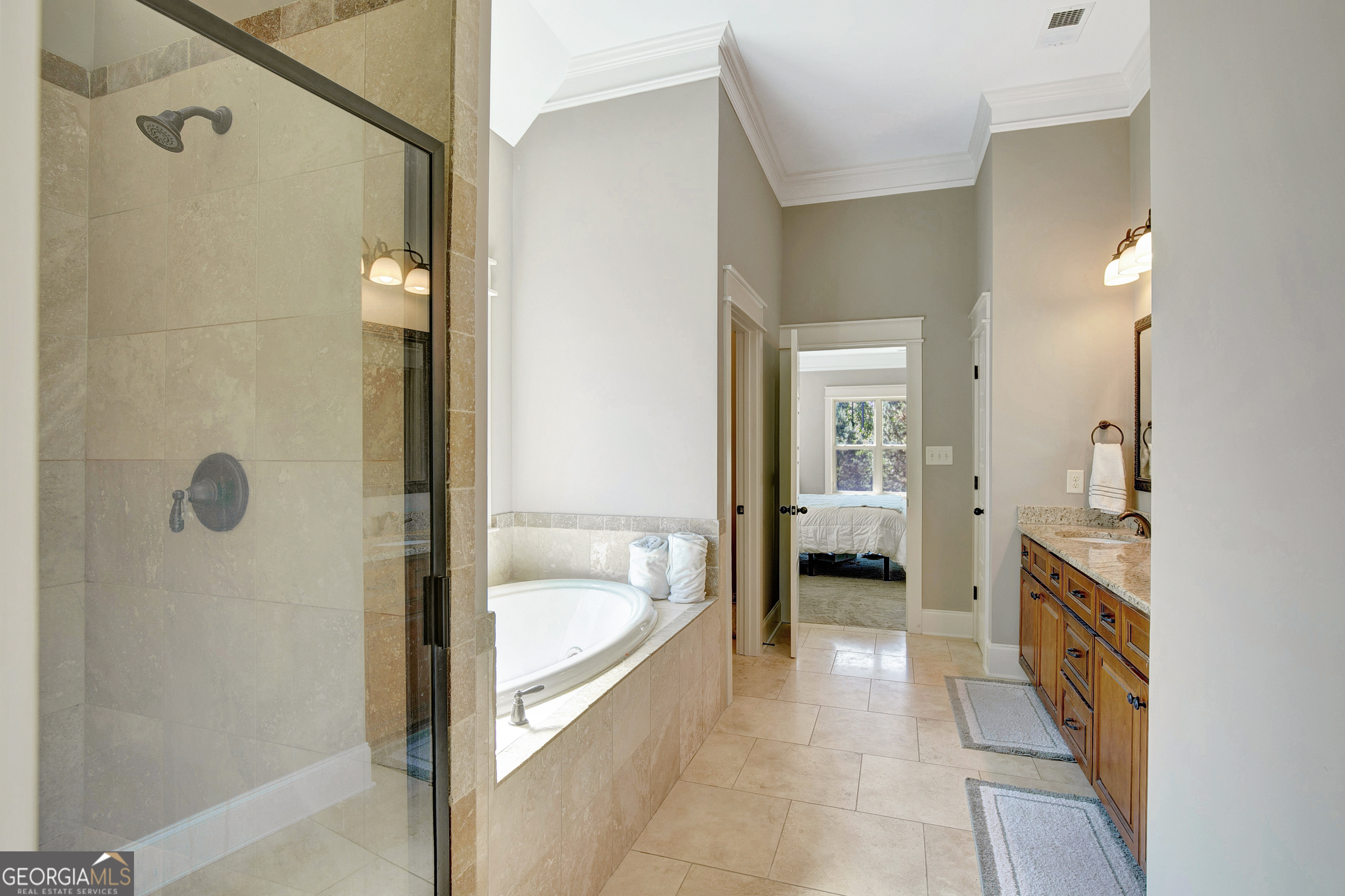 137 Kenmare Row Tyrone, GA 30290 - Photo 29 of 54 a en suite spacious bathroom with a tub shower and sink