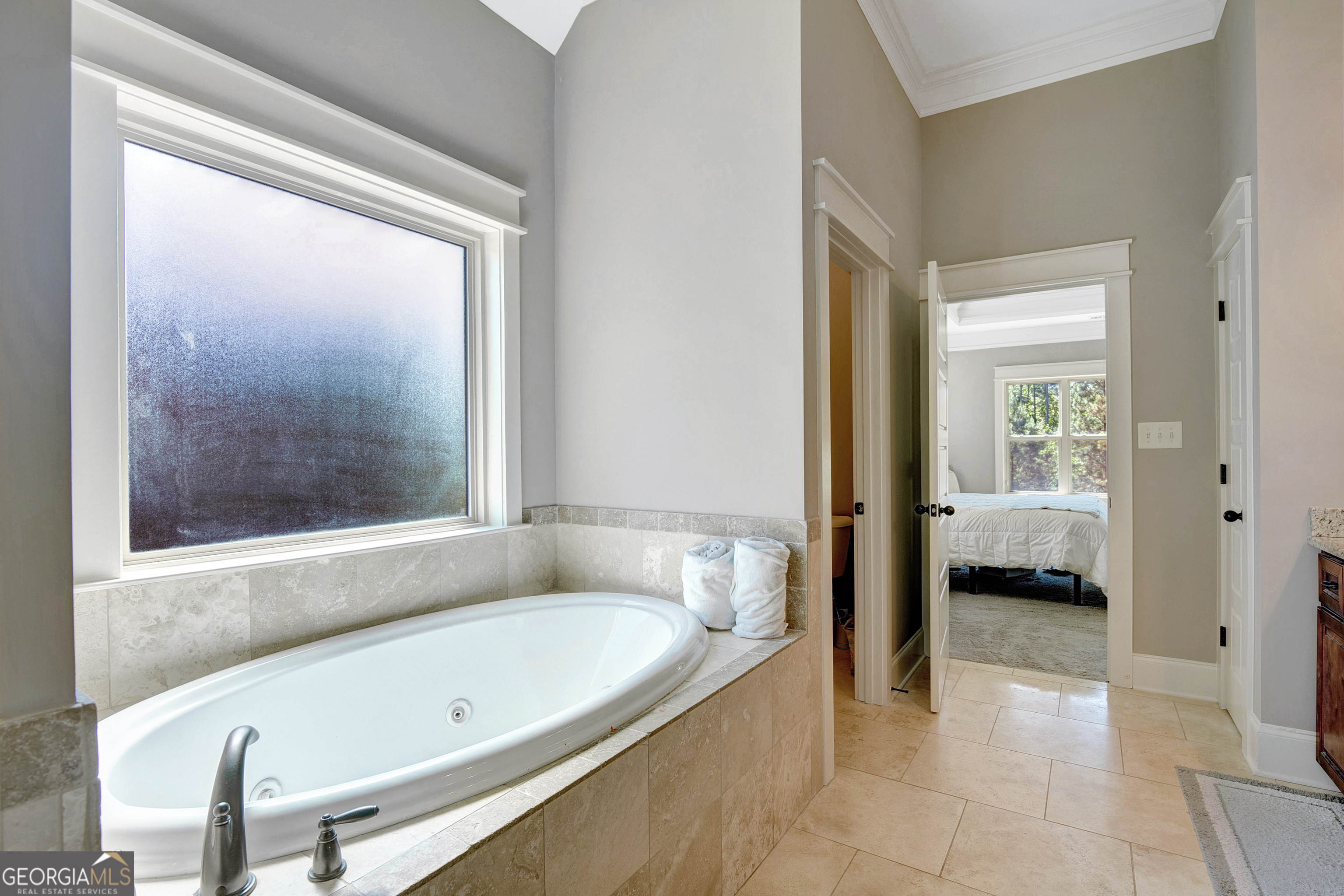 137 Kenmare Row Tyrone, GA 30290 - Photo 31 of 54 a bathroom with a tub and a shower