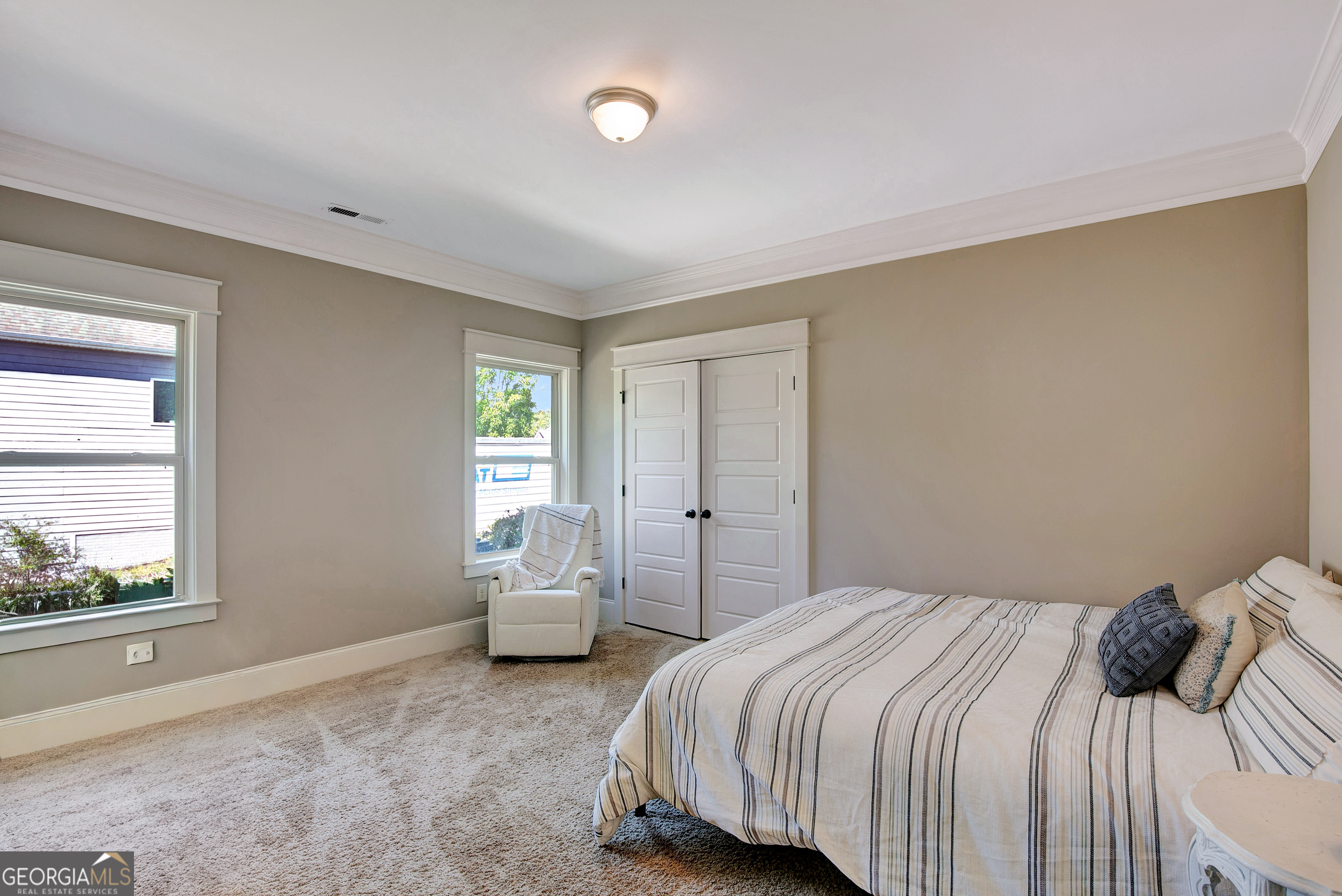 137 Kenmare Row Tyrone, GA 30290 - Photo 37 of 54 a bedroom with a bed and window