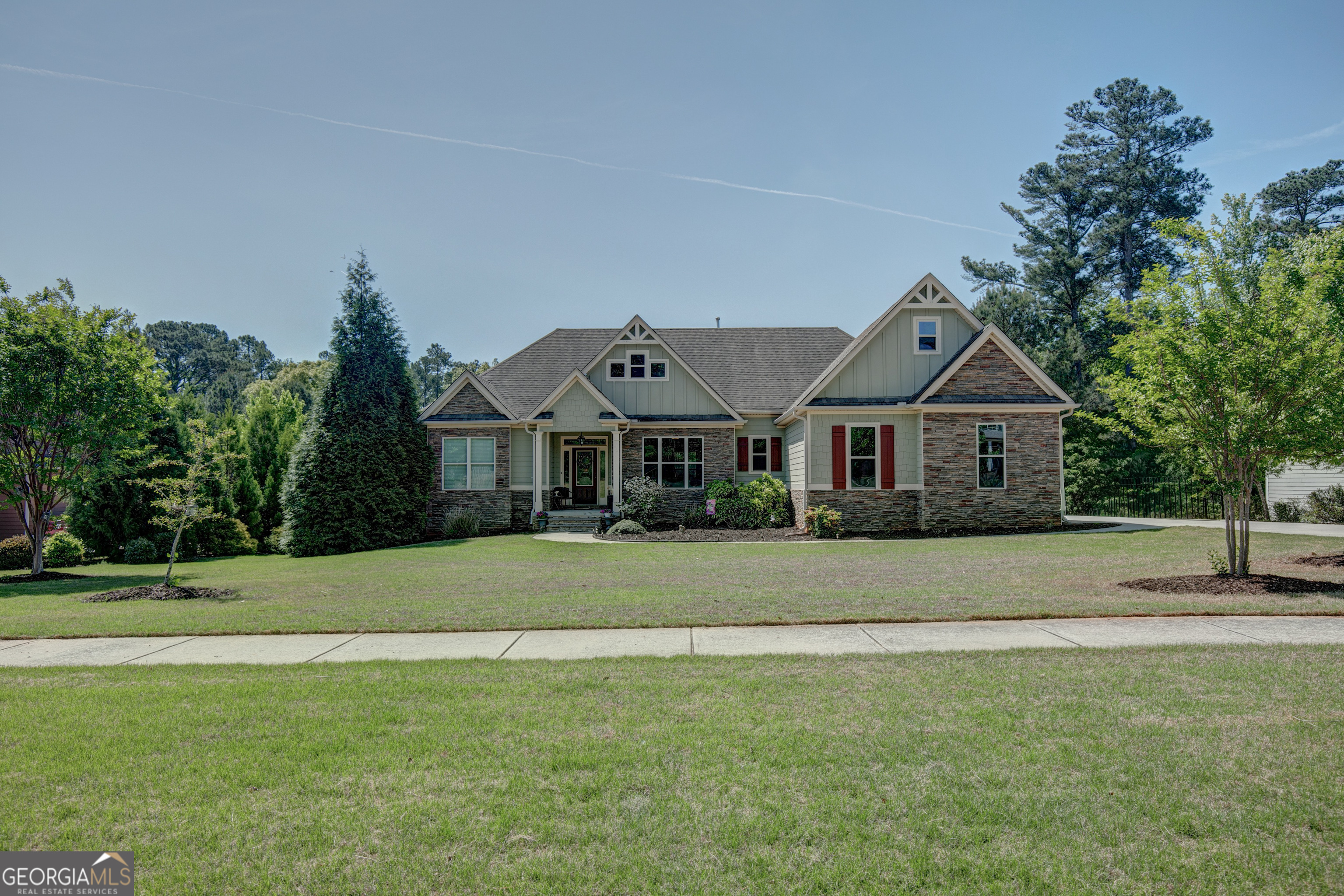 137 Kenmare Row Tyrone, GA 30290 - Photo 4 of 54 a front view of a house with a yard