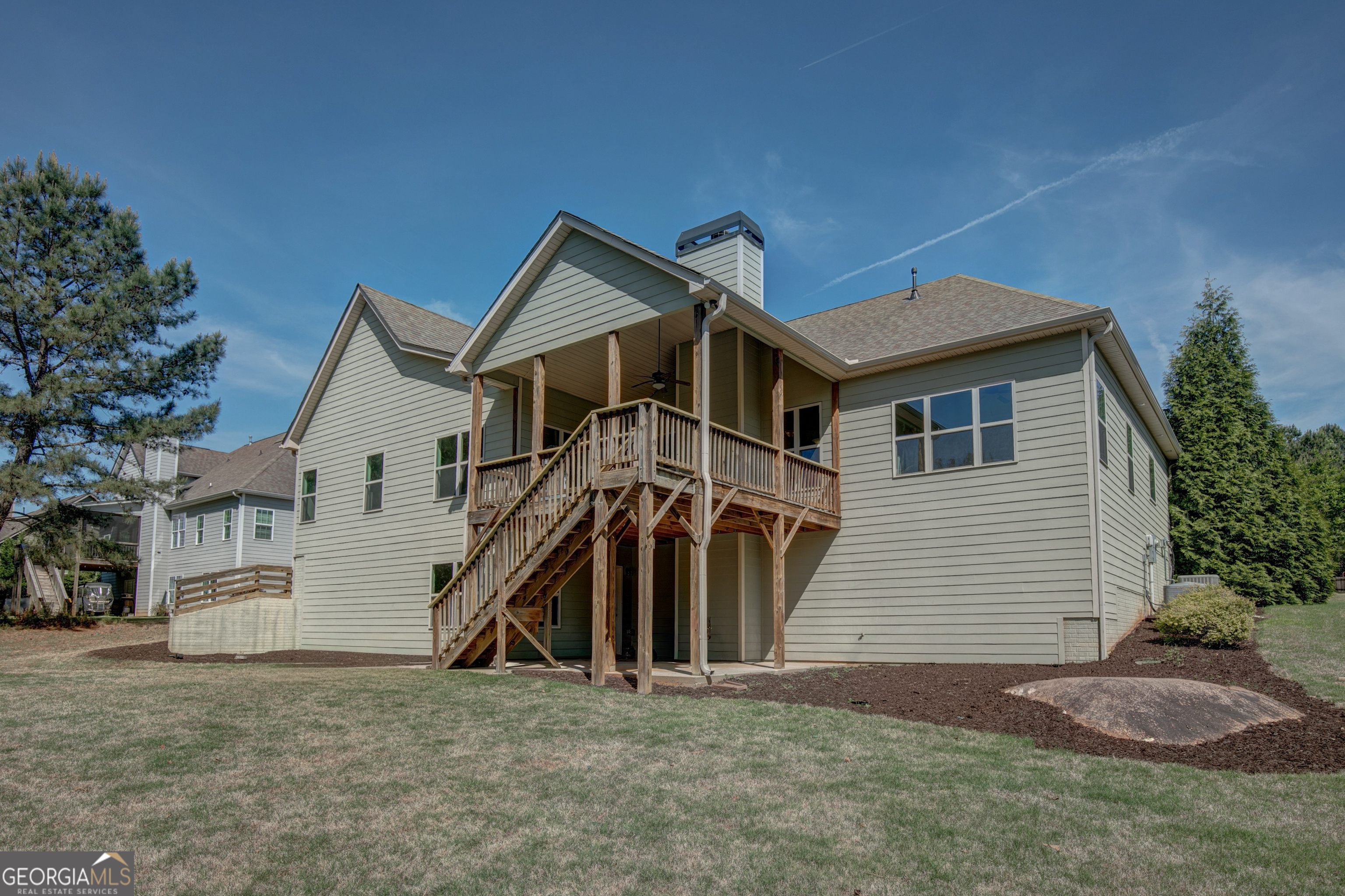 137 Kenmare Row Tyrone, GA 30290 - Photo 43 of 54 a front view of a house with a yard