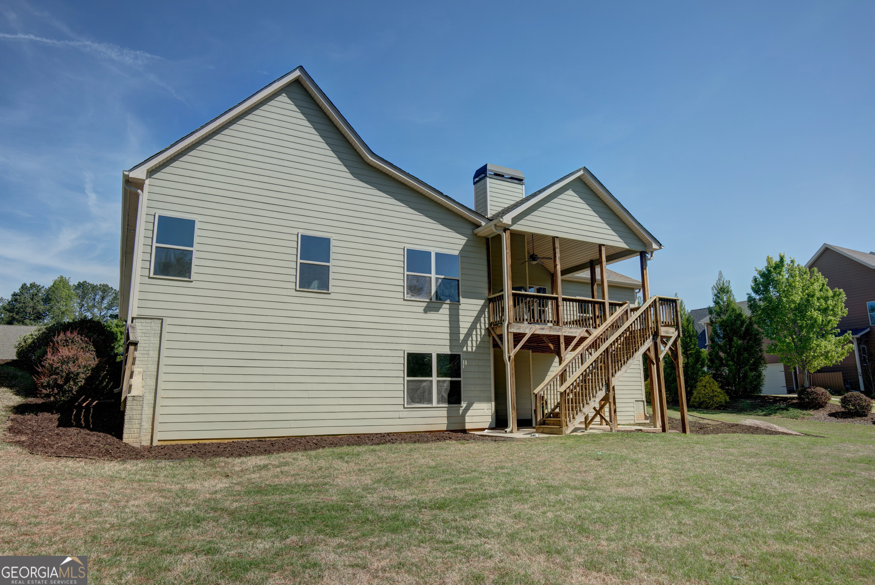 137 Kenmare Row Tyrone, GA 30290 - Photo 44 of 54 a view of a house with a yard and potted plants