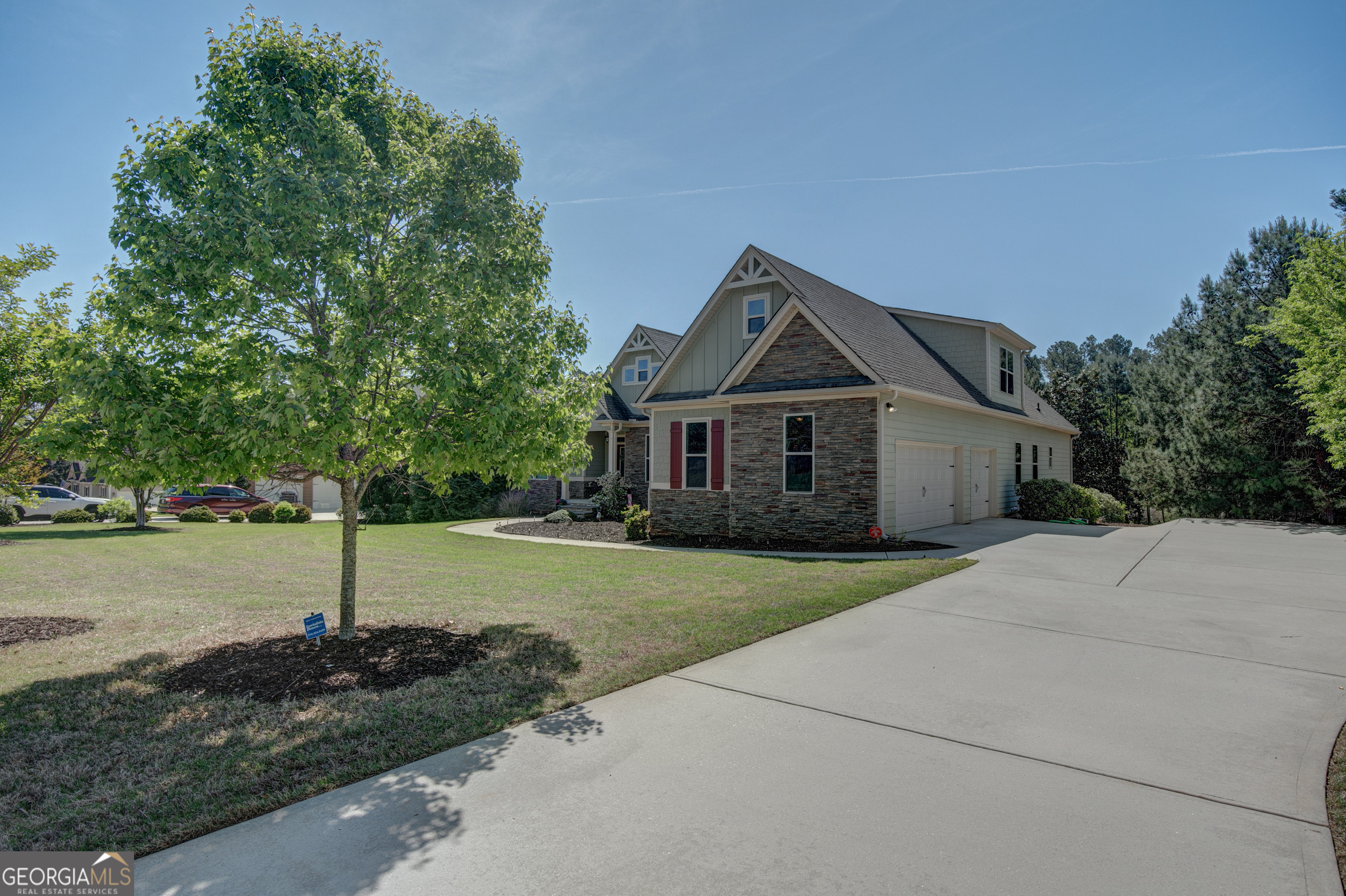 137 Kenmare Row Tyrone, GA 30290 - Photo 47 of 54 a front view of a house with a yard