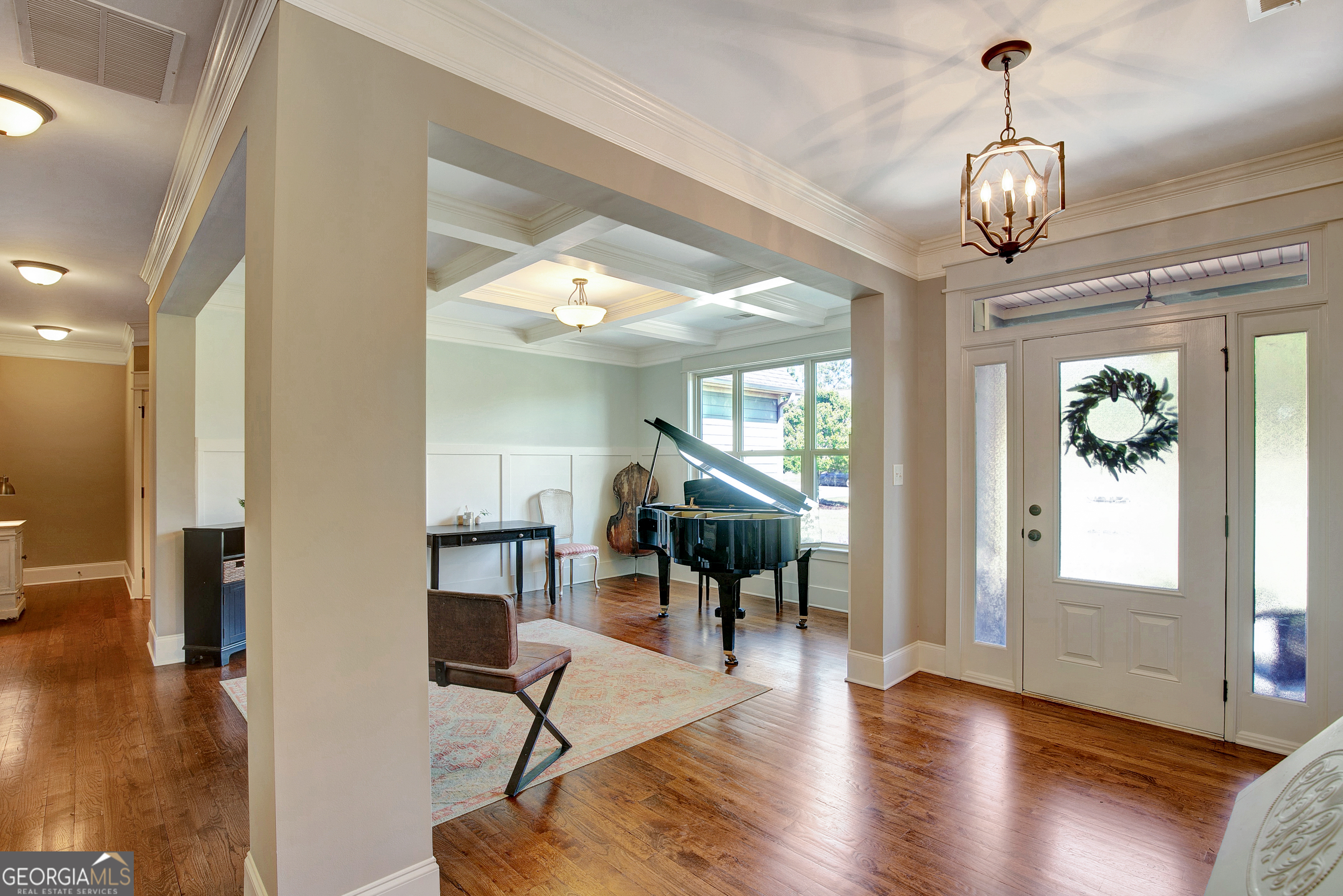 137 Kenmare Row Tyrone, GA 30290 - Photo 7 of 54 a view of a dining room with furniture window and wooden floor