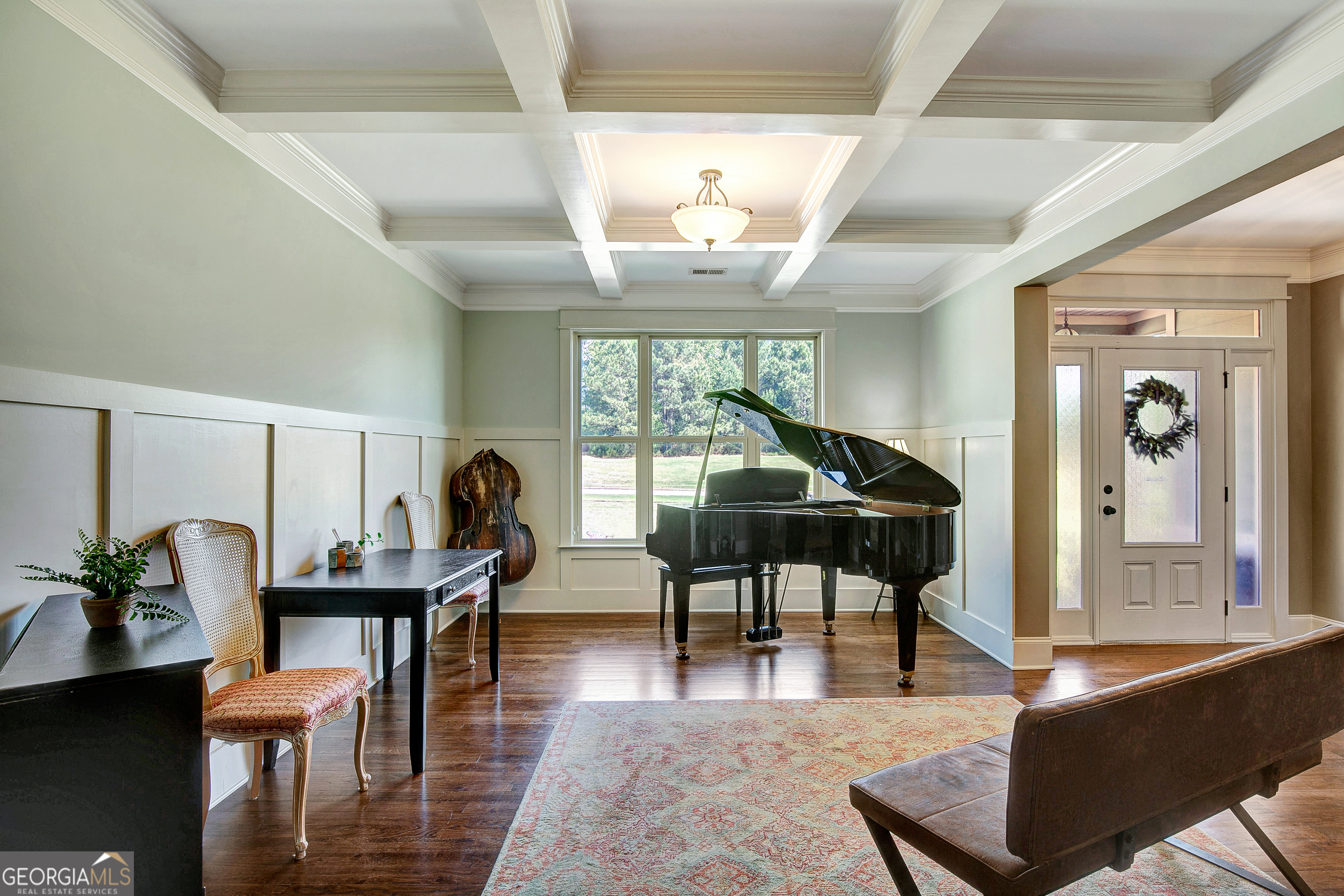 137 Kenmare Row Tyrone, GA 30290 - Photo 8 of 54 a living room with furniture and a large window
