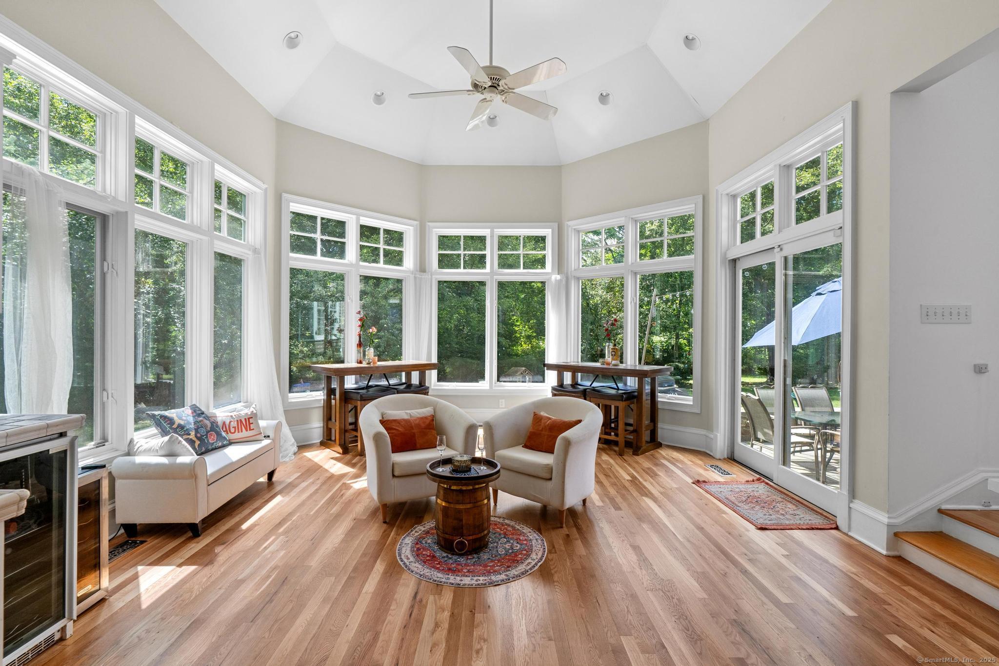 13 Orchard Hill Road Norwalk, CT 06851 - Photo 12 of 40 a living room with furniture and floor to ceiling windows