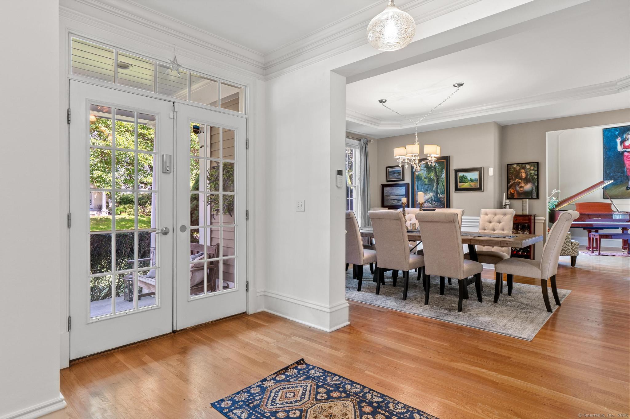 13 Orchard Hill Road Norwalk, CT 06851 - Photo 20 of 40 a view of a dining room with furniture and wooden floor
