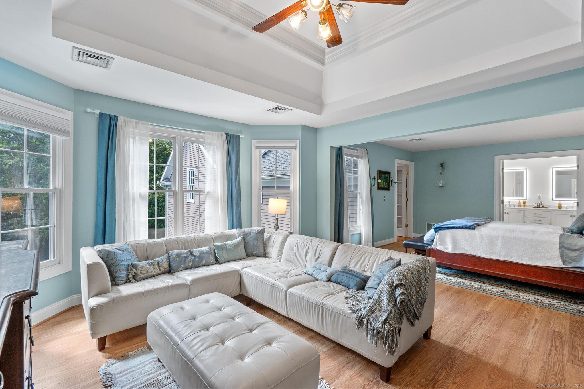 13 Orchard Hill Road Norwalk, CT 06851 - Photo 21 of 40 a living room with furniture and a large window
