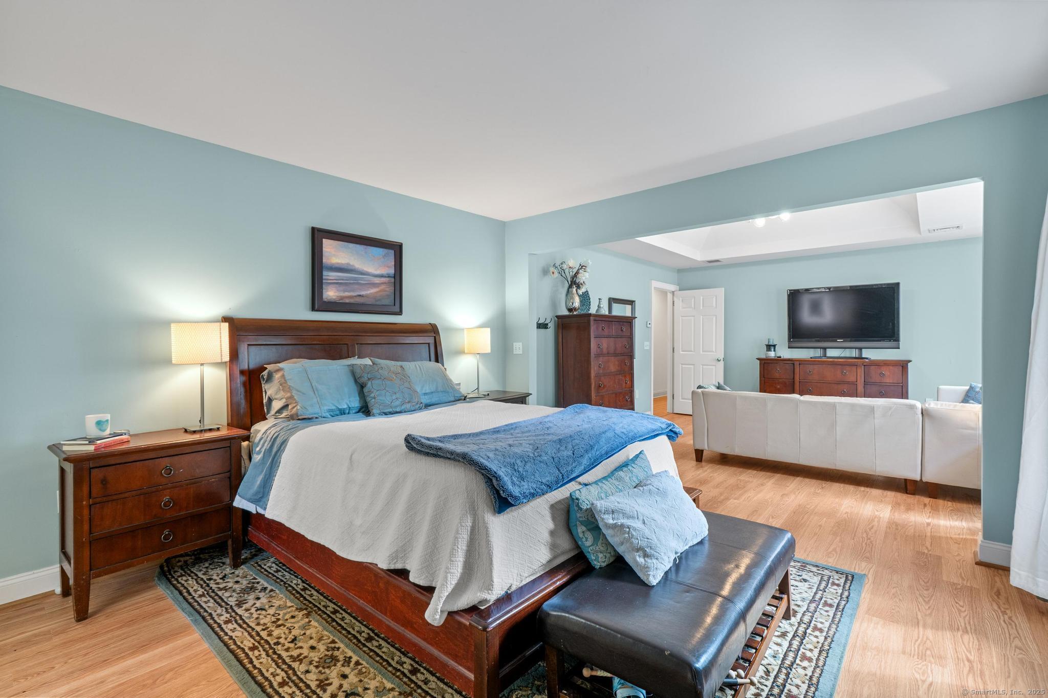 13 Orchard Hill Road Norwalk, CT 06851 - Photo 22 of 40 a bedroom with a bed and a couch