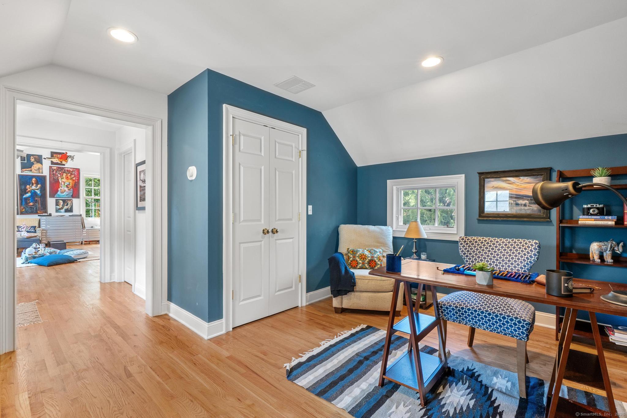 13 Orchard Hill Road Norwalk, CT 06851 - Photo 32 of 40 a workspace with furniture and wooden floor