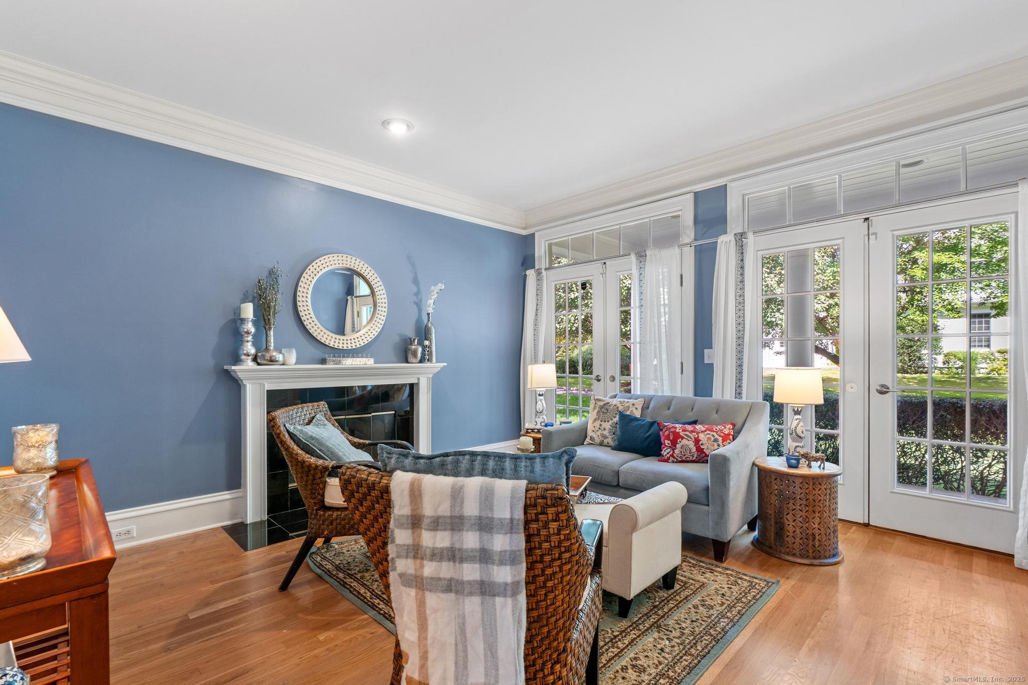 13 Orchard Hill Road Norwalk, CT 06851 - Photo 6 of 40 a living room with furniture and a fireplace