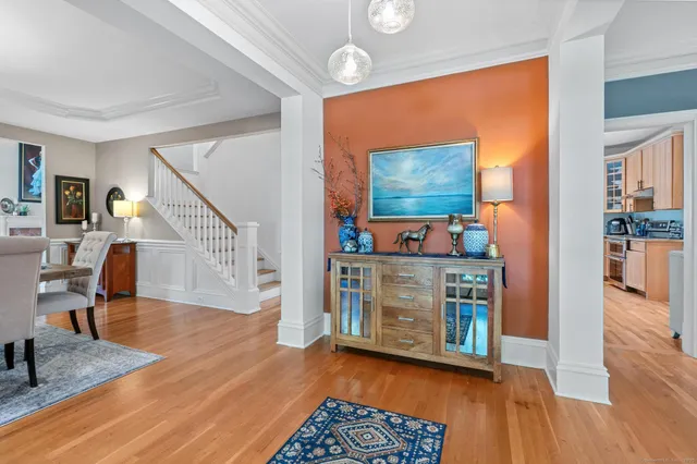 a view of kitchen with furniture and wooden floor