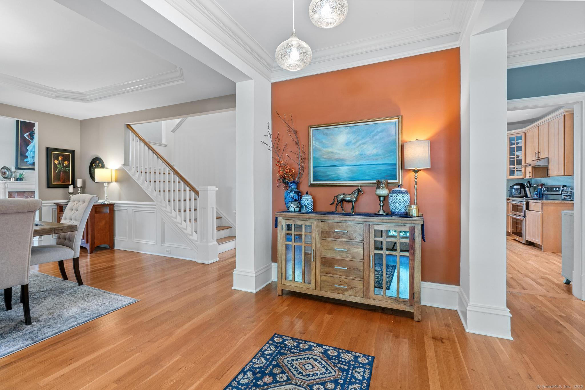 13 Orchard Hill Road Norwalk, CT 06851 - Photo 7 of 40 a view of kitchen with furniture and wooden floor