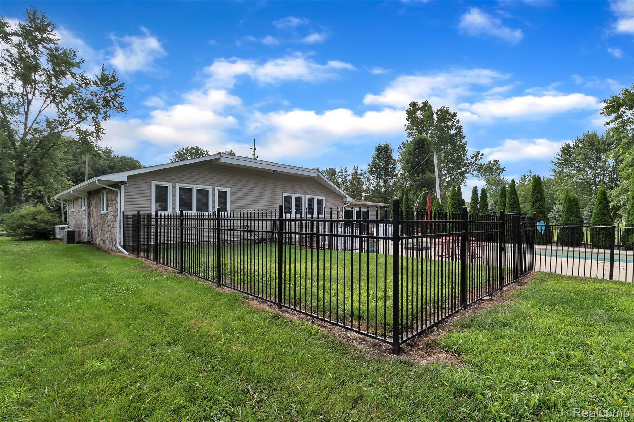 19450 Inkster Road Romulus, MI 48174 - Photo 16 of 60 PARTIAL BACKYARD VIEW/FENCED PEN AREA