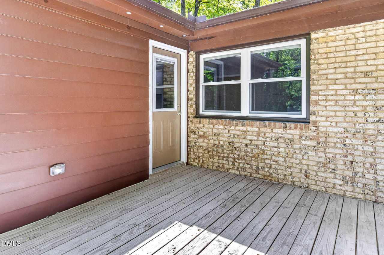 1502 Woodland Road Garner, NC 27529 - Photo 6 of 38 1502 Woodland Rd edit-New Back door