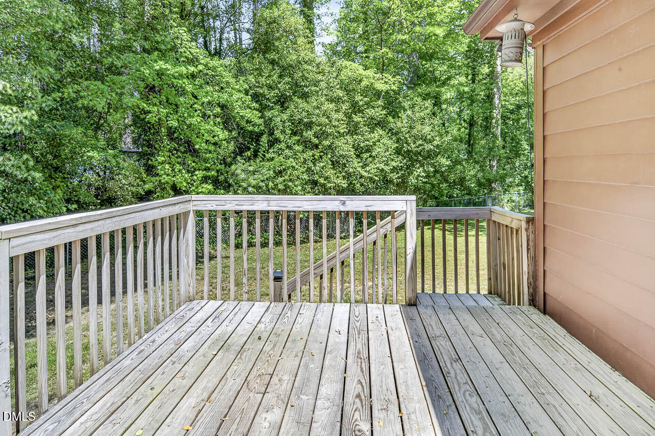 1502 Woodland Road Garner, NC 27529 - Photo 7 of 38 1502 Woodland Rd edit-2-2 New back deck