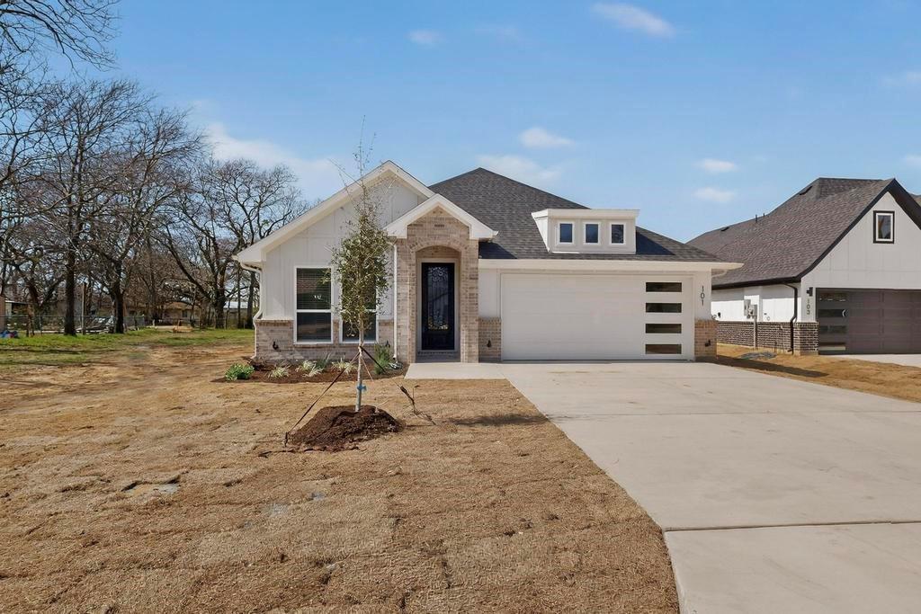 101 Boone Street Edgewood, TX 75117 - Photo 2 of 40 a house view with a outdoor space
