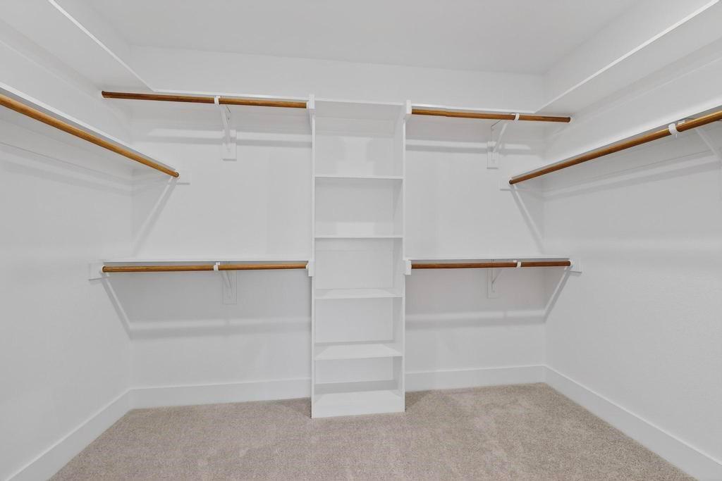 101 Boone Street Edgewood, TX 75117 - Photo 27 of 40 a view of an empty walk in closet