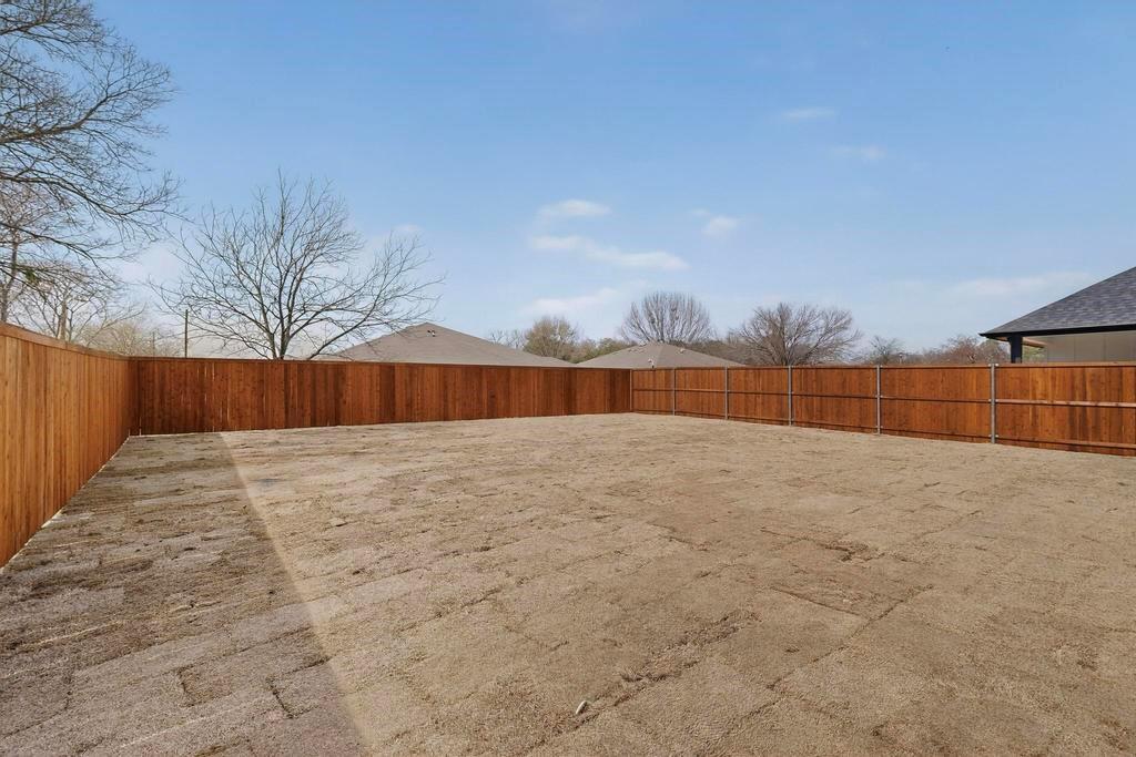 101 Boone Street Edgewood, TX 75117 - Photo 39 of 40 a view of a backyard