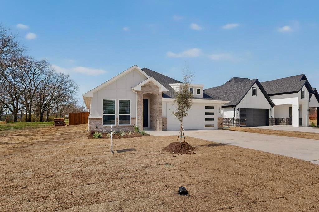 101 Boone Street Edgewood, TX 75117 - Photo 4 of 40 a view of a house with backyard and trees