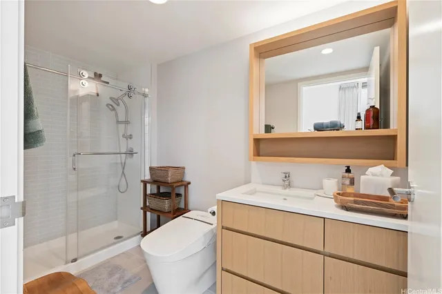 a large white bed in a white room