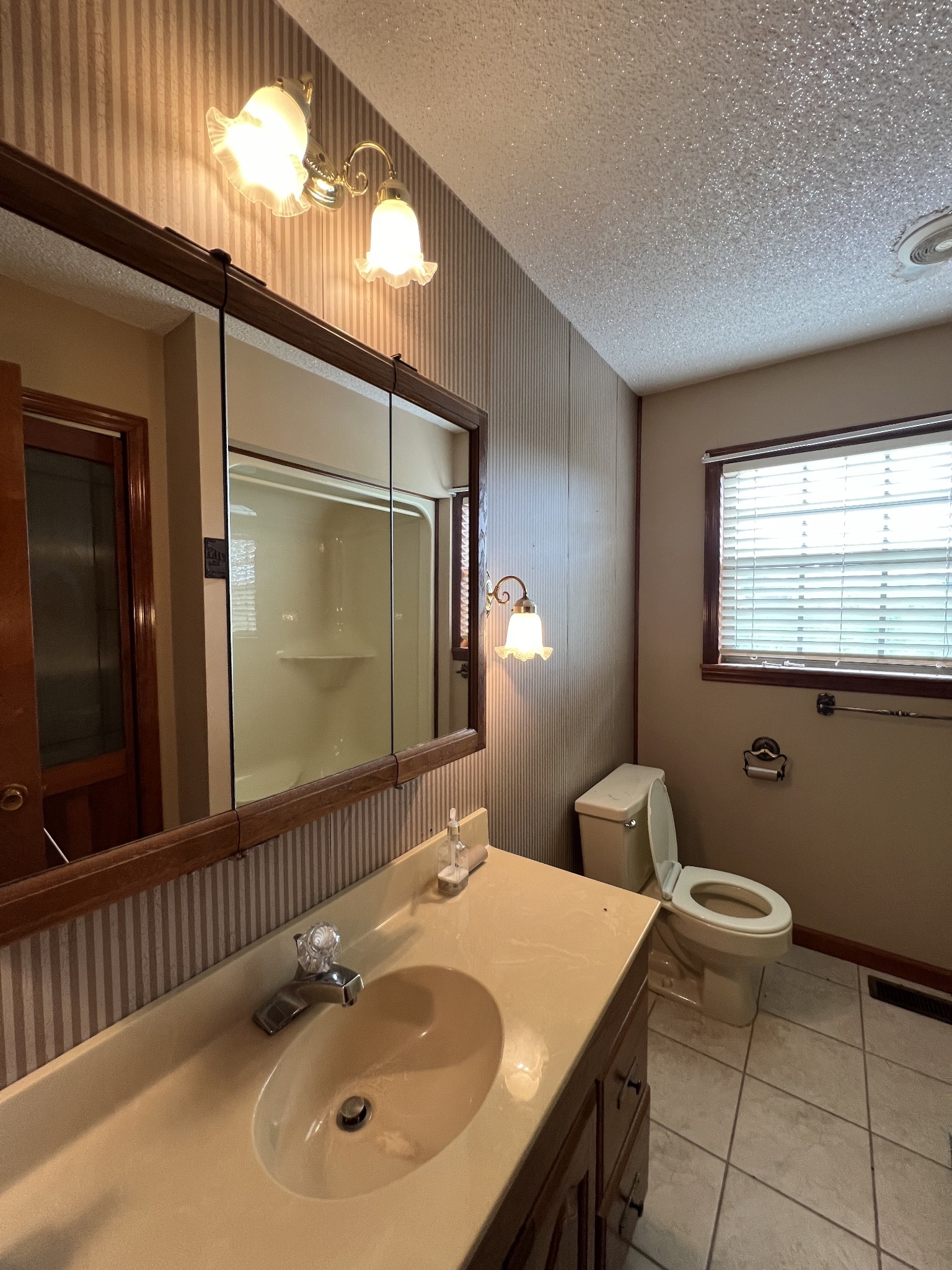 13254 Galen Road Lafayette, TN 37083 - Photo 15 of 19 a bathroom with a sink a toilet and mirror