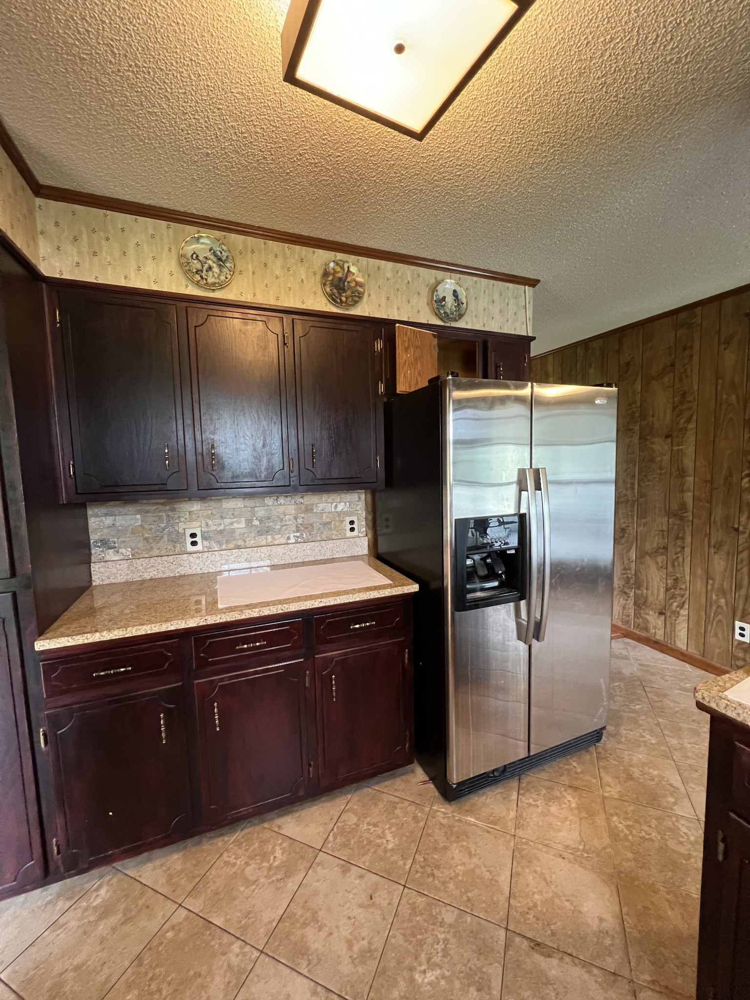 13254 Galen Road Lafayette, TN 37083 - Photo 7 of 19 a bathroom with a sink and a refrigerator
