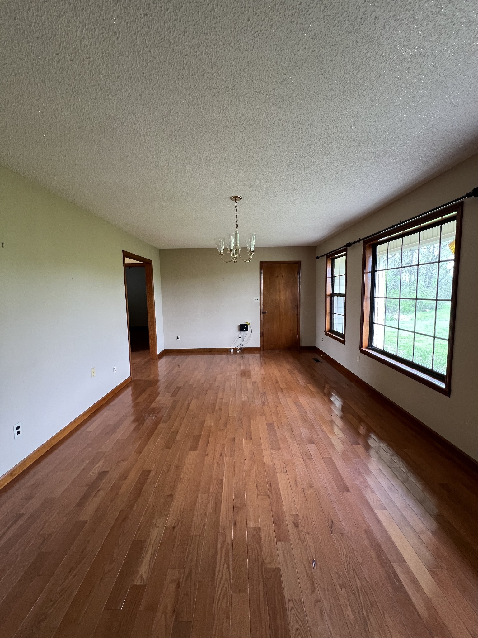 13254 Galen Road Lafayette, TN 37083 - Photo 9 of 19 wooden floor in an empty room with a window