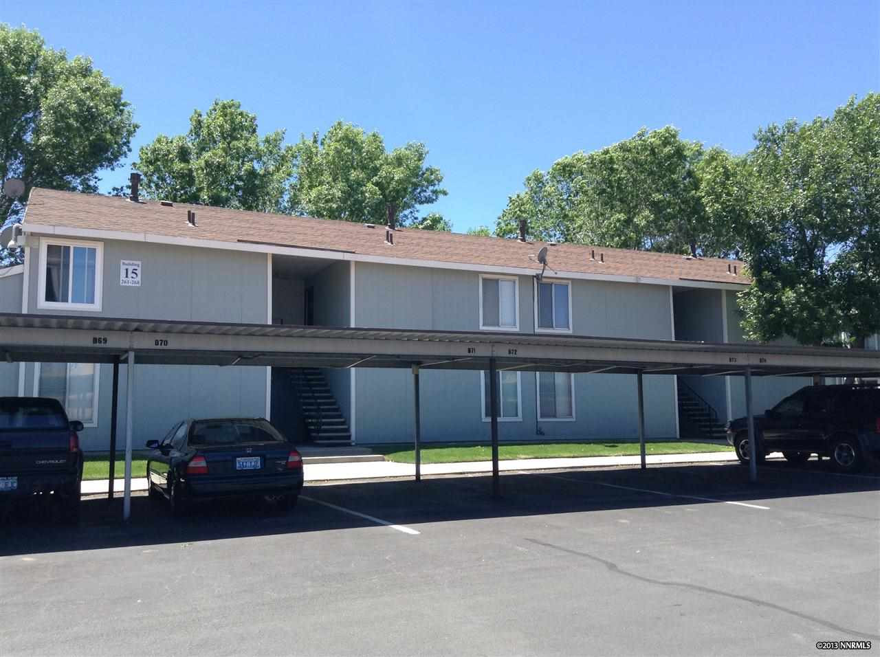 4608 Neil Road, Unit 266 Reno, NV 89502 - Photo 1 of 1 a view of a car park in front of house