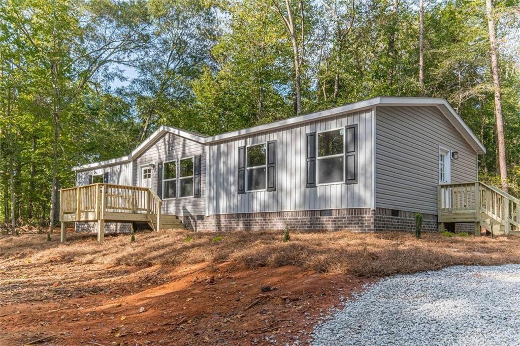 637 Old Ridge Road Demorest, GA 30535 - Photo 1 of 1 a front view of a house with a yard