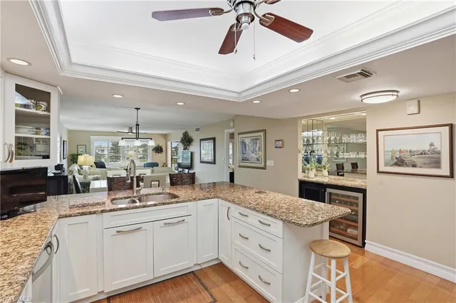 a sign broad in front of a white house