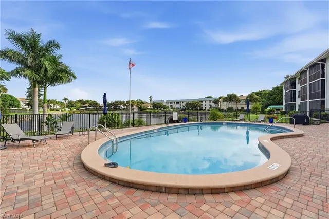 an outdoor view of house with backyard