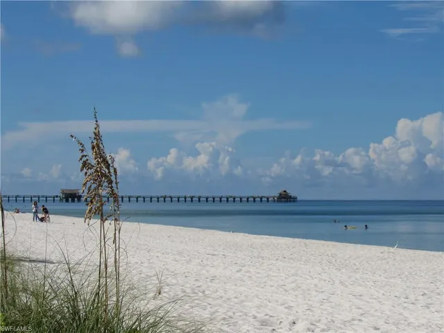 a view of a swimming pool with a terrace