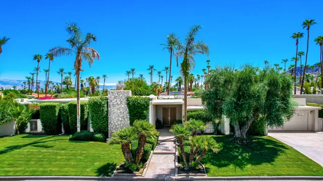 a house view with a garden space