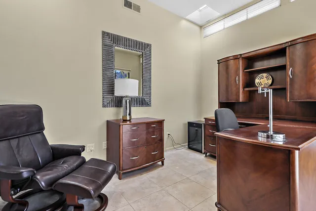 a view of workspace with a couch