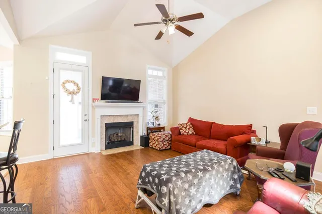 a living room with furniture a fireplace