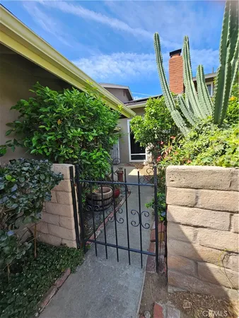 a backyard of a house with seating space