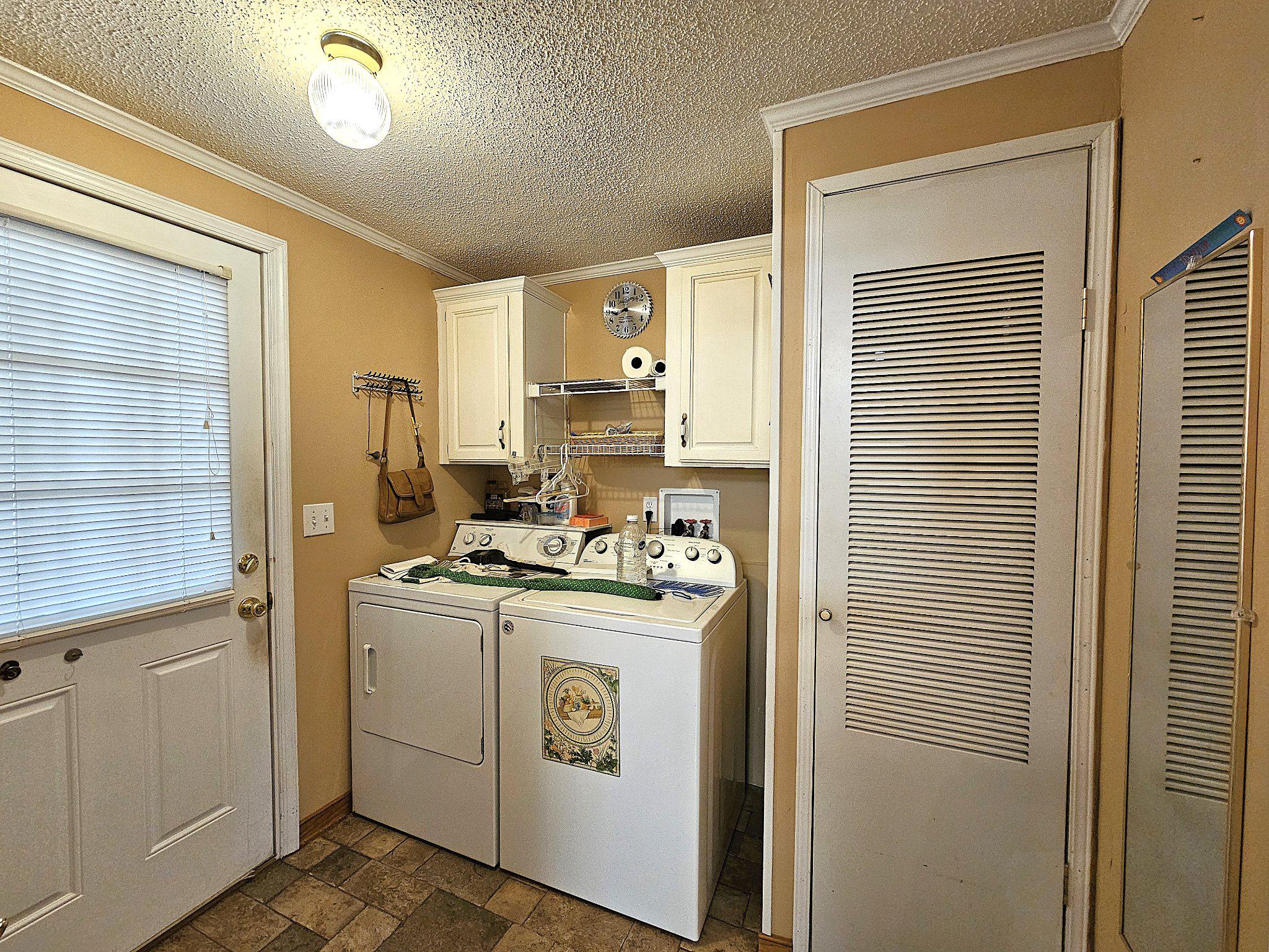 147 Old County Road Mineral, VA 23117 - Photo 22 of 35 Laundry space w/pantry & exits to enclosed porch