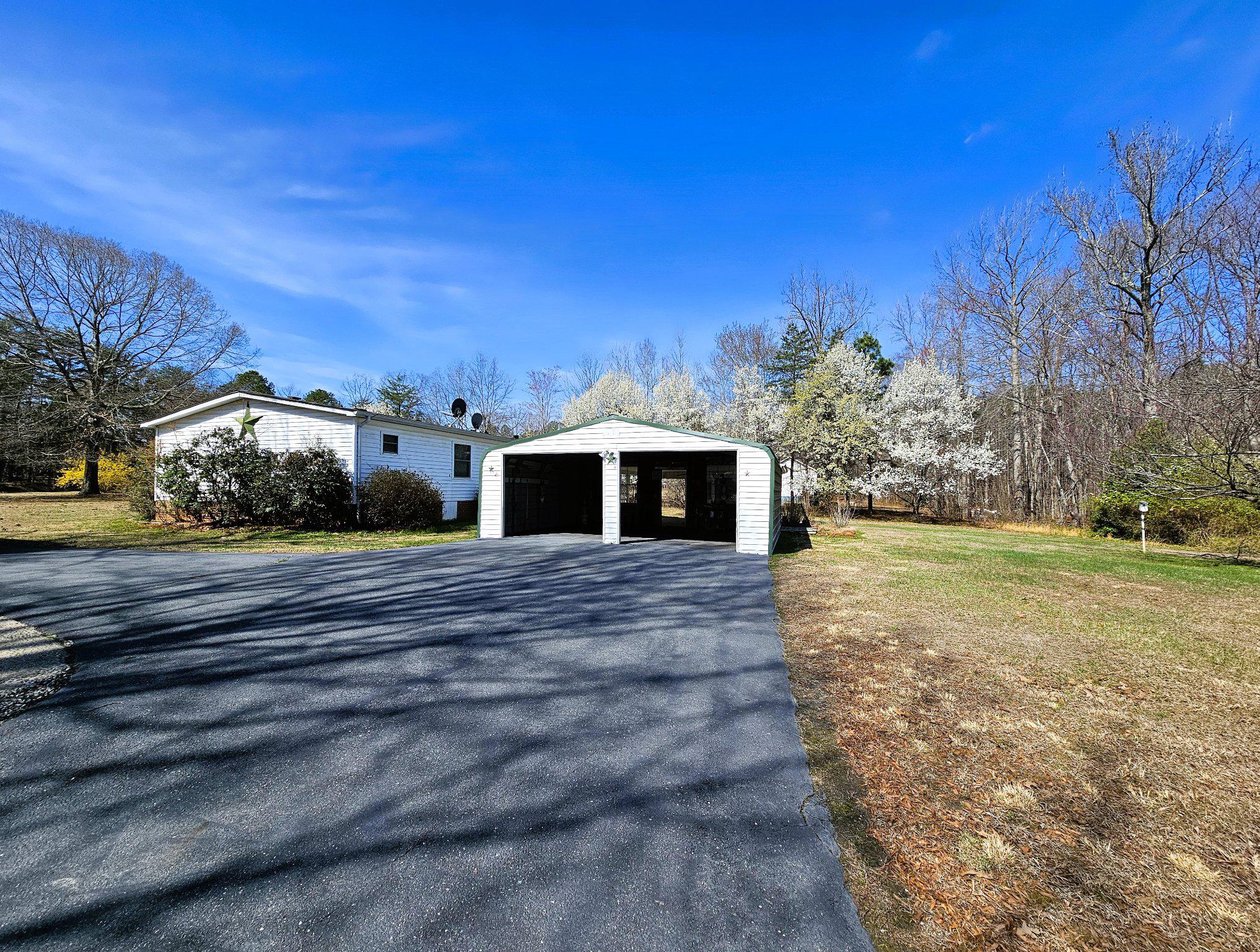 147 Old County Road Mineral, VA 23117 - Photo 8 of 35 Paved driveway & 2 car carport - plenty of parking