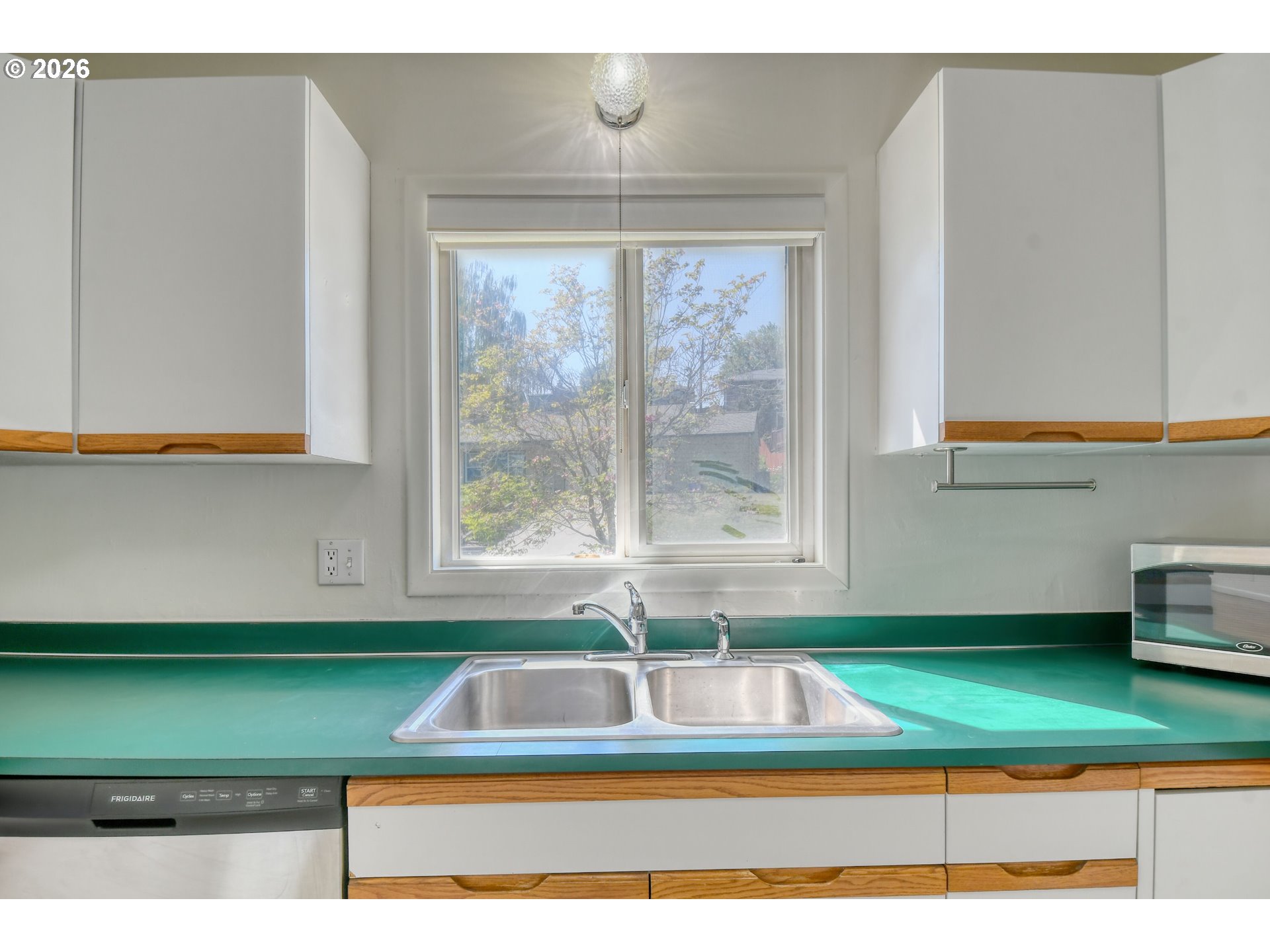 812 Northwest 11th Street Pendleton, OR 97801 - Photo 11 of 28 a kitchen with a sink and a large window