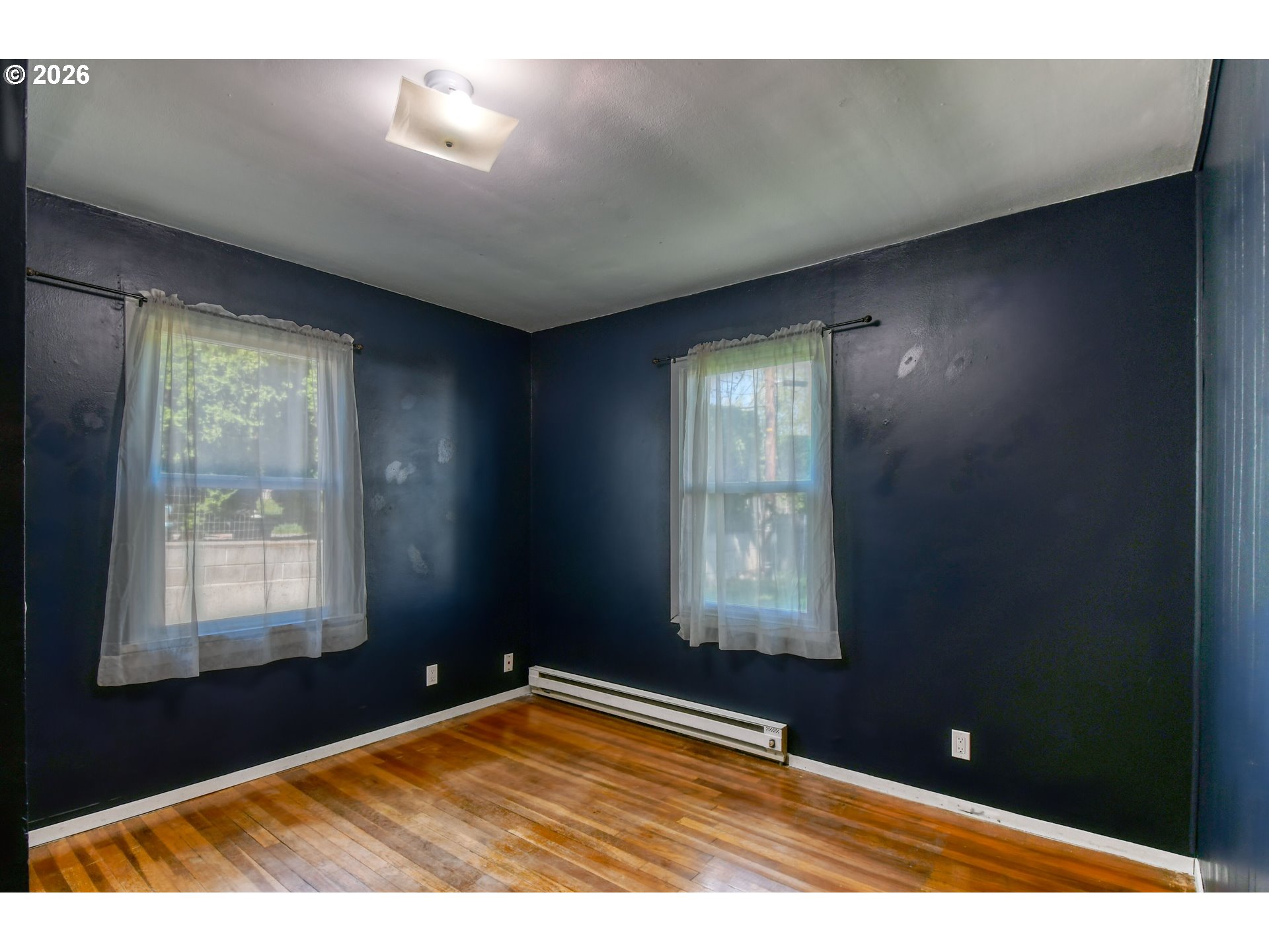 812 Northwest 11th Street Pendleton, OR 97801 - Photo 20 of 28 a view of an empty room with a window