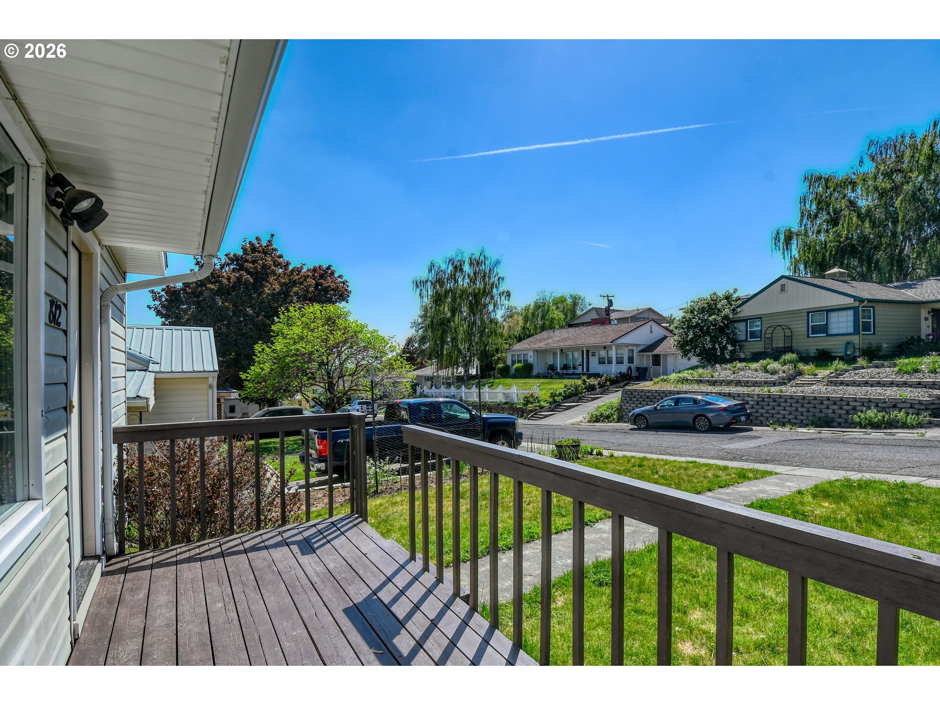 812 Northwest 11th Street Pendleton, OR 97801 - Photo 4 of 28 a view of balcony with wooden floor and outdoor seating