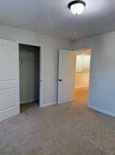 313 Clover Brook Drive Locust Grove, GA 30248 - Photo 5 of 13 an empty room with a window