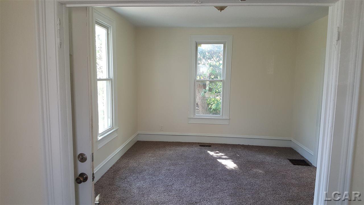 307 Addison Street Adrian, MI 49221 - Photo 5 of 16 31331786-4.JPG