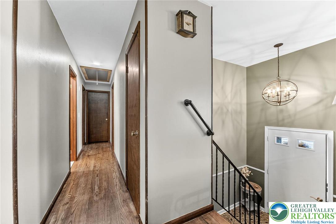 394 Manor Drive Nazareth, PA 18064 - Photo 18 of 44 a view of a hallway with wooden floor