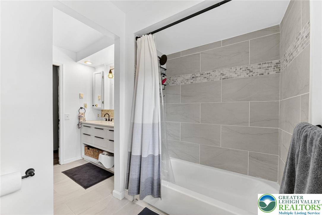 394 Manor Drive Nazareth, PA 18064 - Photo 20 of 44 a bathroom with a shower and a bath tub