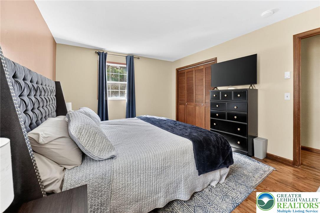 394 Manor Drive Nazareth, PA 18064 - Photo 22 of 44 a bedroom with a bed and a television