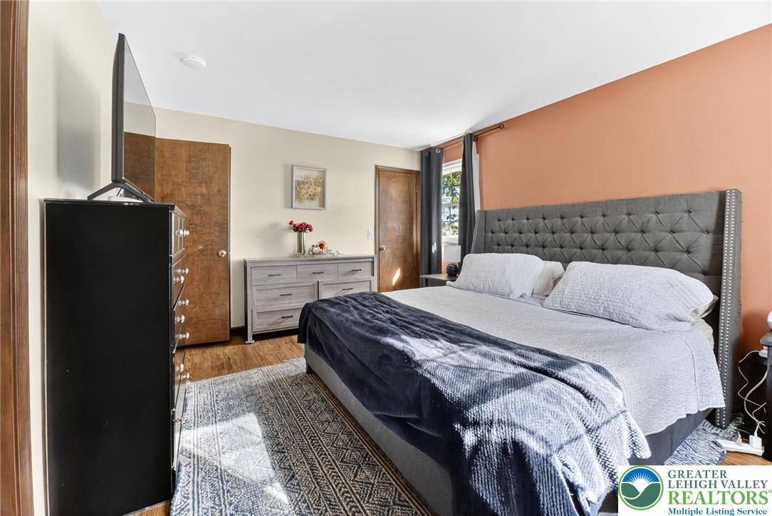 394 Manor Drive Nazareth, PA 18064 - Photo 23 of 44 a bedroom with a bed and dresser